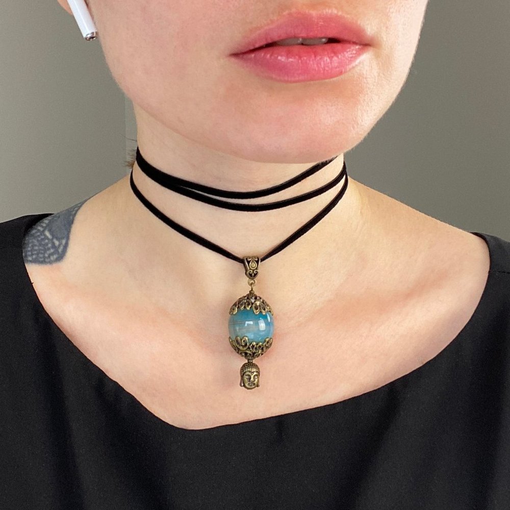 Large blue stone crystal Buddha charm necklace, thin black velvet lace choker